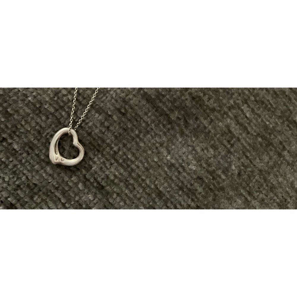 Tiffany & Co Elsa Peretti Open Heart pendant with necklace.